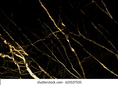 Gold marble texture with lots of bold contrasting veining (Natural pattern for backdrop or background, Can also be used for create surface effect to architectural slab, ceramic floor and wall tiles)
