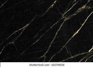 Gold marble texture with lots of bold contrasting veining (Natural pattern for backdrop or background, Can also be used for create surface effect to architectural slab, ceramic floor and wall tiles)