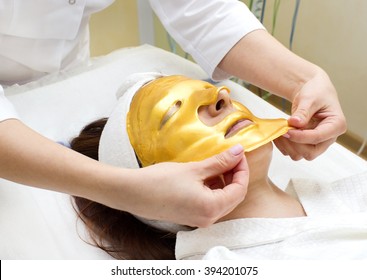 Gold Mask Cosmetic Procedure In The Beauty Salon