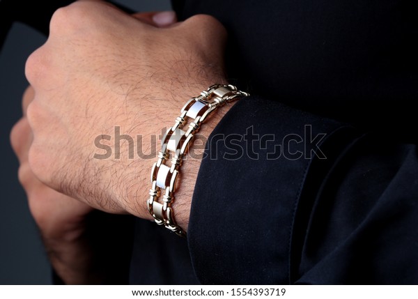Gold Men Bracelet On Hand Stock Photo (Edit Now) 1554393719