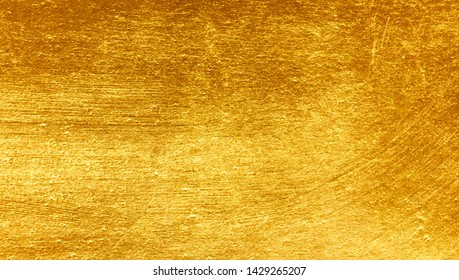 Goldener, gebürsteter Hintergrund oder Textur aus gebürstetem Stahl