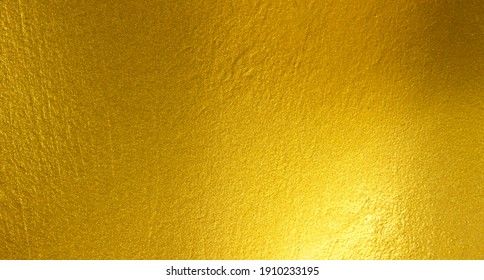 Gold metal brushed background or texture of brushed steel - Shutterstock ID 1910233195