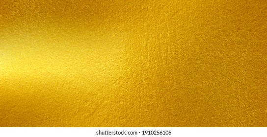 Gold metal brushed background or texture of brushed steel - Shutterstock ID 1910256106