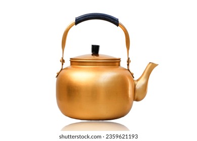 Gold metal kettle on white background. Tea pot.