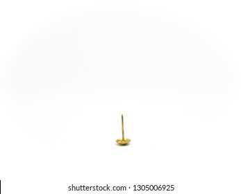 Gold Metal Thumb Tack On Isolated White Background