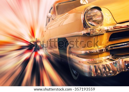 Gold metallic vintage car in high speed motion