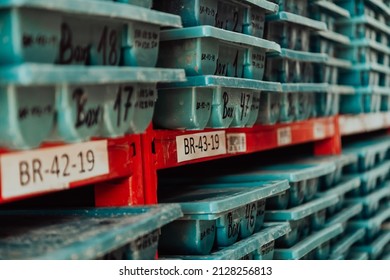 Gold Mining Storage Rock Core Samples Geology Drilling Industy. Large Ore Warehouse In Modern Industry, Ores Stacked In Boxes. Selective Focus 