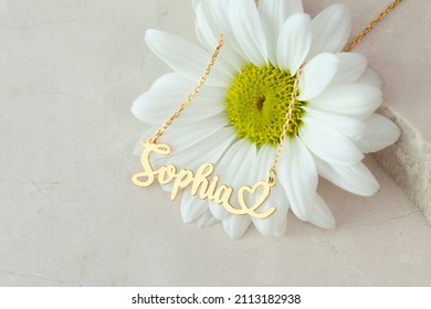 The Gold Name Necklace With Heart Is A Still Life Image. Personalized Necklace Image. Jewelry Photo For E-commerce, Online Sale, Social Media.