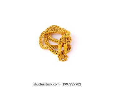 Gold Necklace Isolated On A White Background