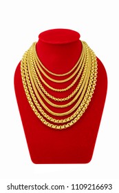 Gold Necklace On Necklace Display Stand. Gold Necklaces On Red Mannequin