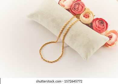 Gold Necklace With Rose Background