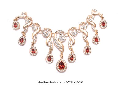 gold necklace with rubies - Shutterstock ID 523873519