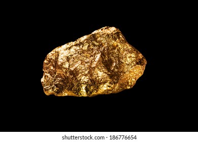 Gold Nugget Isolated On Black Background.