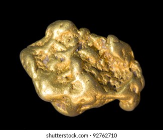 Gold Nugget Isolated On Black. This Is Real.