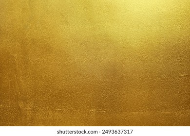 Gold Paint on Concrete Wall Texture Background.