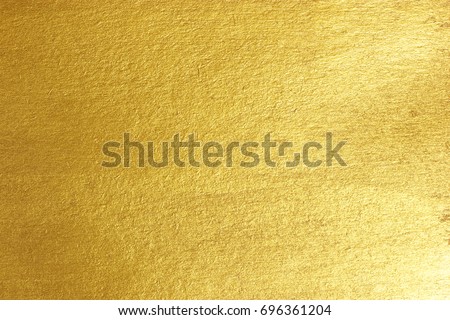 Gold paper background Golden paper surface as background