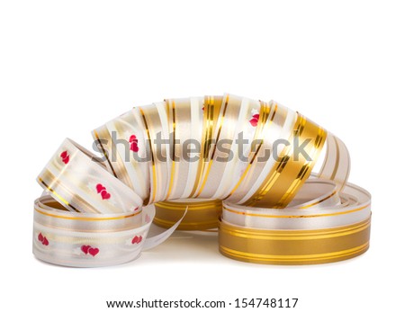 Gold paper horizontal ribbon on the white isolated background