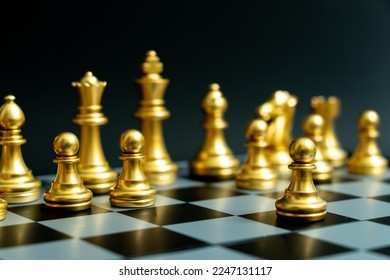 Gold pawn is on the first move in chess game on black background (Concept for business decision, start or beginning project) - Shutterstock ID 2247131117