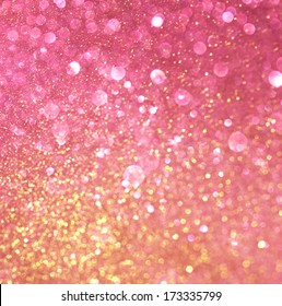 gold and pink abstract bokeh lights. defocused background 