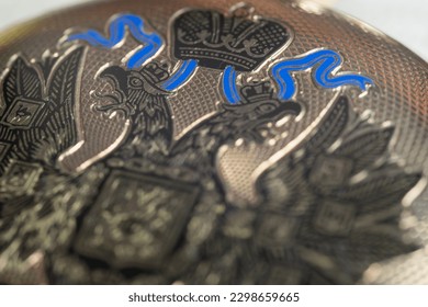 Gold pocket watch "Pavel Bure" on a gold pendant. Royal Russia. pocket watch on a dark background with books. Image of an antique gold pocket watch on an old antique book.