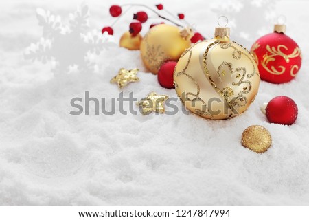 Similar – Image, Stock Photo Golden Christmas ornaments on snow background