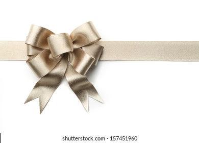 Gold Ribbon With Bow Isolated On White