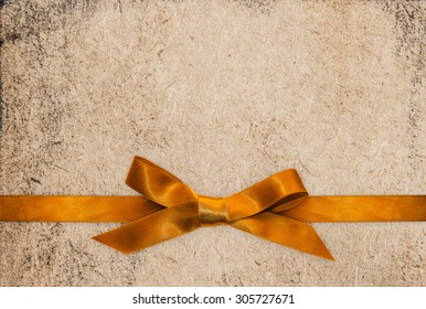 Gold Ribbon Bow On Textured Paper Stock Photo 305727671 | Shutterstock