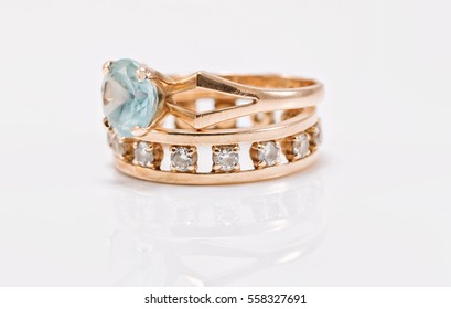 Gold Ring With Light Topaz And A Thick Ring With Small Diamonds