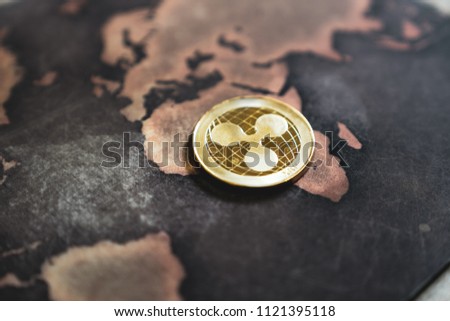 Gold Ripple XRP Coin Token on World Map in Africa