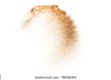 Gold sand explosion isolated on white background. Abstract sand cloud splash. Sandy fly wave in the air. - Shutterstock ID 780585391