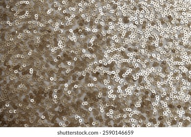 gold sequin fabric texture. pattern of material with sequin in the light golden color