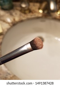 Gold Shimmer Eyeshadow On Brush