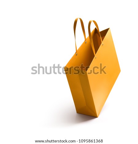 Gold shopping bag isolated on white background