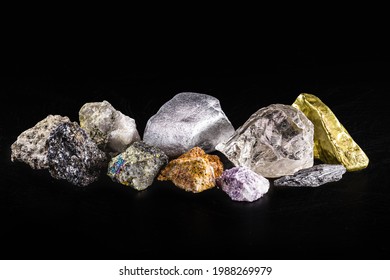 gold, silver, rough diamonds, bauxite, pyrolusite, galena, pyrite, chromite, lepidolite, chalcopyrite. Collection of stones extracted in Brazil, mineralogy, Brazilian mineral wealth - Shutterstock ID 1988269979