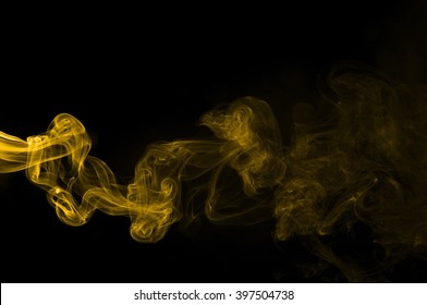 Gold Smoke On Black Background 