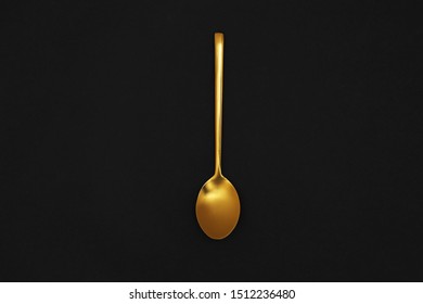 Gold Spoon On Black Background, Top View