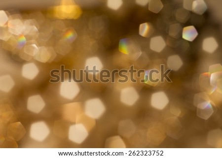 Gold spring or summer background. Elegant abstract background with bokeh defocused lights