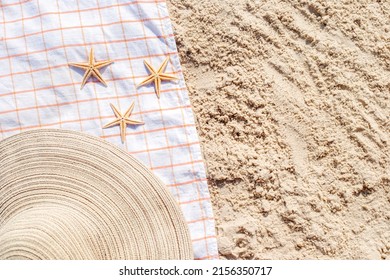 Gold Starfish, Hat On The Sandy Beach. Top View, Flat Lay. 