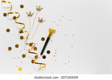 Gold Stars, Crown And Tinsel On A White Background