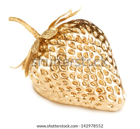 Gold strawberry isolated on white