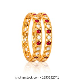 Gold And Studded Bracelet On White Background