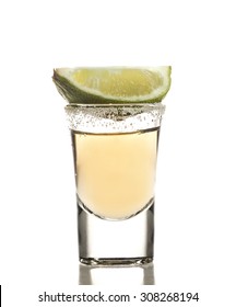 Gold Tequila Shot With Lime Fruit Isolated On White Background