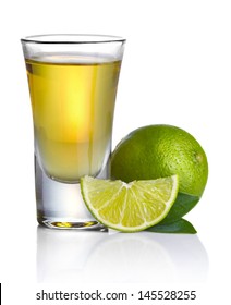 Gold Tequila Shot With Lime Isolated On White Background