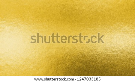 Gold texture background metallic golden foil or shinny wrapping paper bright yellow wall paper for design decoration element