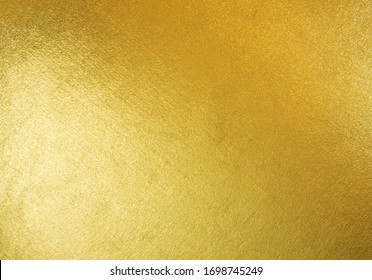 Gold Texture Background With Yellow Luxury Shiny Shine Glitter Sparkle Of Bright Light Reflection On Golden Surface, For Celebration Backdrop, Wallpaper, Christmas Decoration Background Or Any Design
