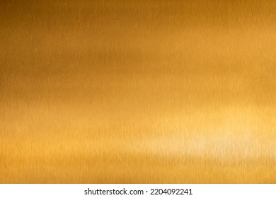 Gold Texture Background With Yellow Metallic Foil Luxury Shiny Shine Glitter Sparkle Of Bright Light Reflection. Metal Bronze Golden Surface, Celebration, Banner, Wallpaper, Design. Gold Surface
