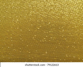 Gold Thread On The Fabric.
