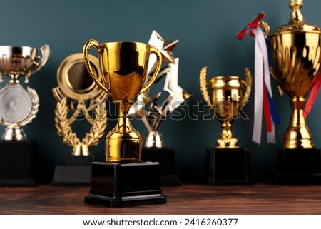 Gold Trophy with a row of gold trophy background Foto stock © 