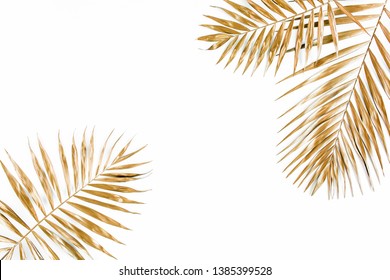 Gold Tropical Palm Leaves On White Background. Flat Lay, Top View Minimal Concept.