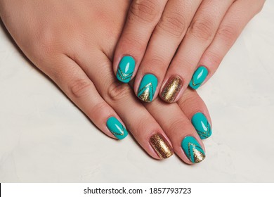 Gold   turquoise abstract painting nail art